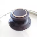 Entlüftbarer Deckelknopf